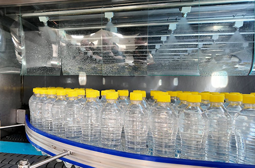 12,000BPH 500ml CSD Bottling Line with Rotary Blow Molder and Volumetric Filler